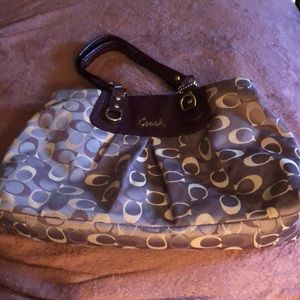Purple Coach (signature) satchel.